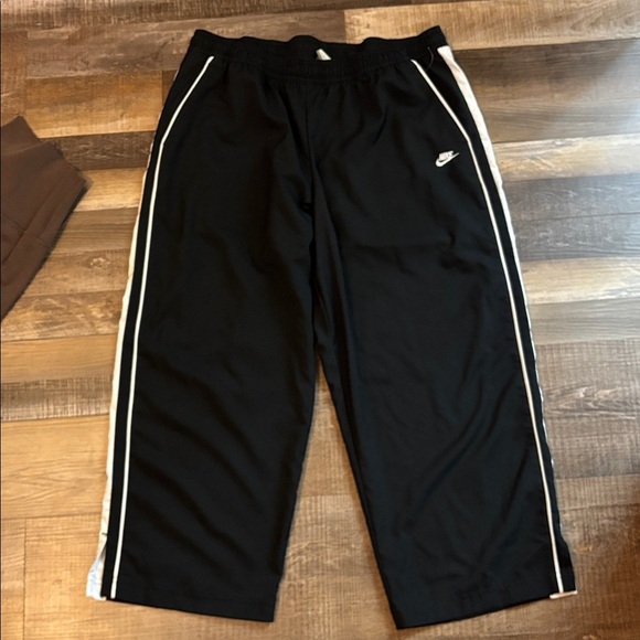 Nike Black Crooped Pants with White Stripe - Picture 1 of 4